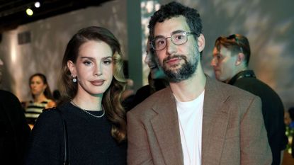 Lana Del Rey in a black top and Jack Antonoff in a white shirt and brown jacket at Variety&#039;s Hitmakers Brunch Presented by AFEELA at NYA WEST in Los Angeles.