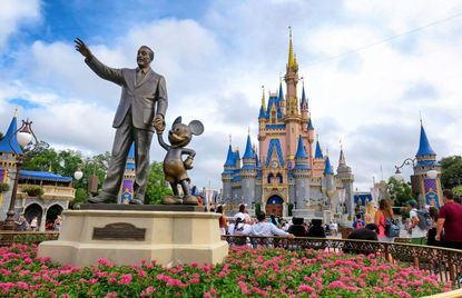 The &quot;Partners&quot; statue of Walt Disney and Mickey Mouse, at Cinderella Castle at the Magic Kingdom, at Walt Disney World, in Lake Buena Vista, Florida