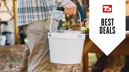 Person holding a YETI Rambler Beverage Bucket with deals overlay