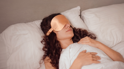 image of a woman wearing one of the best silk eyemasks