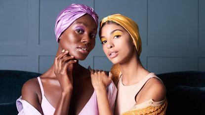 two women wearing silk hair wraps