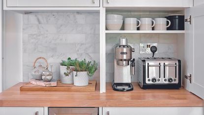 Kitchen with coffee station and mug storage