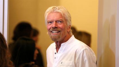 richard branson on a yellow background