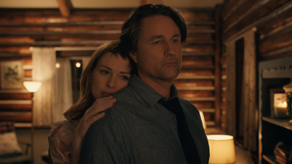 Alexandra Breckenridge as Mel Monroe and Martin Henderson as Jack Sheridan embracing in a cabin like room in virgin river season 6