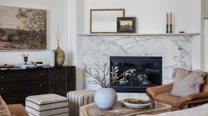 A white living room with natural decor