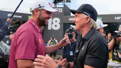 Marc Leishman and Greg Norman at a LIV Golf event