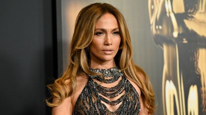 Jennifer Lopez in a grey dress at unstoppable premiere