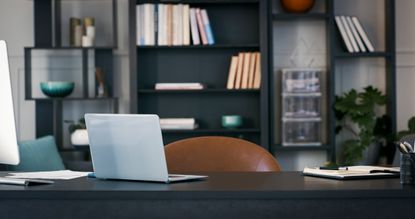 image of a laptop on a desk in a home office