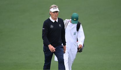 Bernhard Langer walks up to the green at the Masters