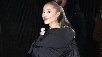 Ariana Grande wearing a sleeping bag coat in new york city