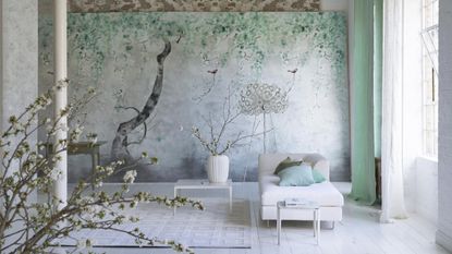 green and white living room, minimalist, white chaise, white side tables, green botanical mural, pale green drapes, white floor