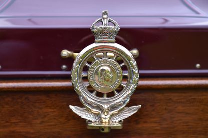 An old RAC (Royal Automobile Club) brass badge on 1911 Renault CC