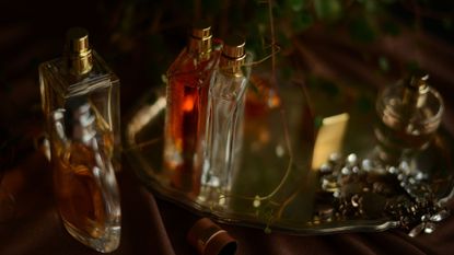 Perfume bottles on mirrored vanity