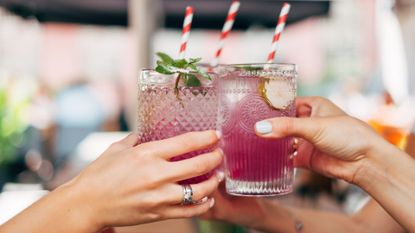 Women drinking cocktails together