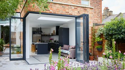 Single storey brick extension with corner bifold doors