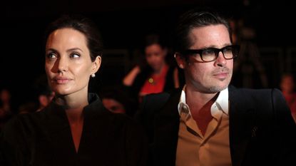 Angelina Jolie and Brad Pitt attend the Global Summit to End Sexual Violence in Conflict at ExCel on June 13, 2014 in London, England