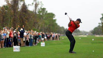 Tiger Woods tees off at the 2023 PNC Championship, held at Ritz-Carlton Golf Club