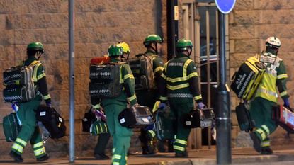 Paramedics arrive at the Manchester Arena in 2017