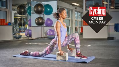  Lady practicing yoga in a gym