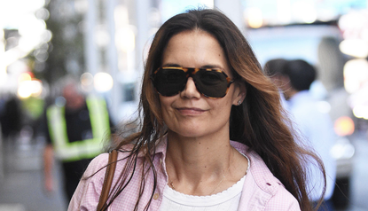 katie holmes wears a pink button-down shirt and white tee