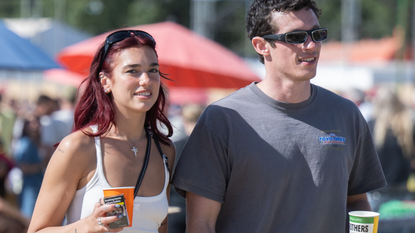 Dua Lipa and Callum Turner during day four of Glastonbury Festival 2024 at Worthy Farm, Pilton on June 29, 2024 in Glastonbury, England.