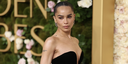 Zoë Kravitz attends the 82nd Annual Golden Globe Awards at The Beverly Hilton on January 05, 2025 in Beverly Hills, California wearing a black saint laurent dress