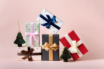 boxes of festive gifts stacked on top of each other