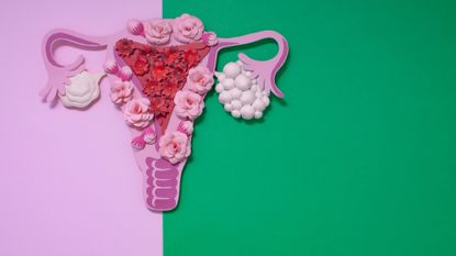 Paper art, awareness of PCOS, image of the female reproductive system, in front of pink and green background