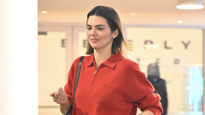 Kendall Jenner is seen on January 05, 2025 in Los Angeles, California wearing a red half-zip sweater and black jeans