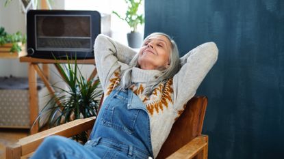 A woman relaxes in a stress free home