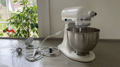 KitchenAid Classic Stand Mixer on the counter with the accessories