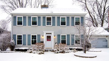 A home covered in snow