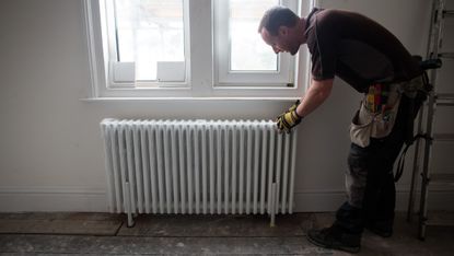 Radiator in a house Matt Cardy/Getty Images