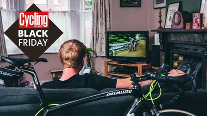 Cyclist watching bicycle racing on the TV