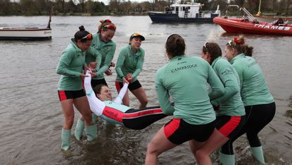 Cox Jasper Parish and the victorious Cambridge women’s crew