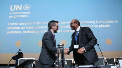 INC-4 chairman Luis Vayas Valdivieso (right) shakes hands with Canada&#039;s Minister of Environment and Climate Change Steven Guilbeault during the fourth session of the UN Intergovernmental Negotiating Committee on Plastic Pollution in Ottawa, Canada, on April 23, 2024.