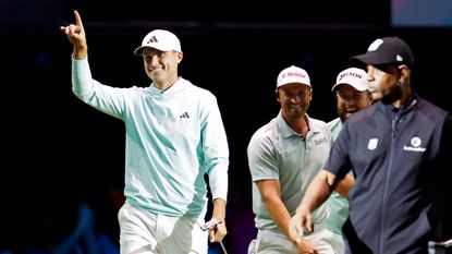 Ludvig Aberg celebrates holing a putt in TGL