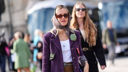 parisian street style woman wearing blazer and head scarf