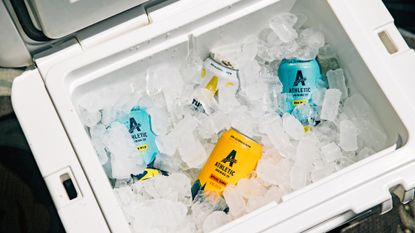 Cans of Athletic nonalcoholic beer are seen in a cooler