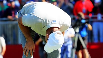 Sergio Garcia reacts to a missed putt on the third green during afternoon fourball matches of the 2016 Ryder Cup 