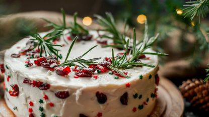 festive cake with rosemary decor