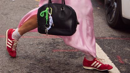 Woman wearing red sneakers in New York City 