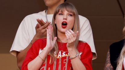 Taylor Swift cheering on her boyfriend Travis Kelce and the Kansas City Chiefs