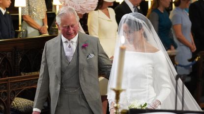 King Charles walked Meghan Markle down the aisle at her royal wedding to Prince Harry in 2018.