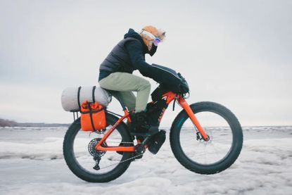 Lael Wilcox rides her fat bike across snow