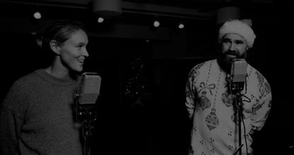 Kylie Kelce and Jason Kelce singing in the music video for holiday song &quot;Loud Little Town&quot; 