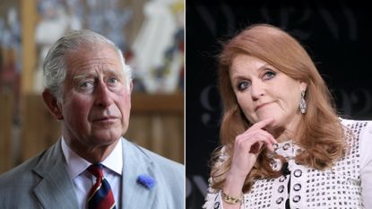 King Charles wears a gray suit and looks pensive and Sarah Ferguson has red hair and wears a white and black jacket