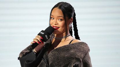 Rihanna onstage during the press conference for Apple Music Super Bowl LVII Halftime Show at Phoenix Convention Center on February 09, 2023 in Phoenix, Arizona