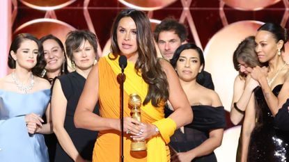 the cast and crew behind emilia perez accepts the golden globe for best picture musical comedy at the 2025 goldne globes