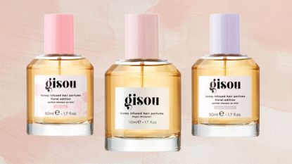 Three product shots of the Gisou Wild Rose, Original and Lavender Berry hair perfume bottls on a muted, pink watercolour paint-style template